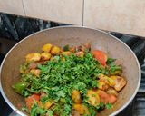A picture of step 7 of Shimla mirch aloo sabzi.