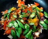 A picture of step 1 of Lahsuni Bhindi or Garlic Okra.