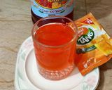 A picture of step 3 of Rooh afza with orange 🍊 tang.