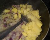 A picture of step 2 of Aalu paneer rice.