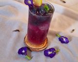 A picture of step 4 of Blue pea magic layered mocktail.