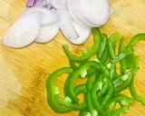 A picture of step 1 of Dal Masoor with capsicum.