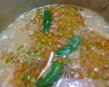 A picture of step 8 of Aloo Matar Gosht.