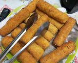 Foto del paso 6 de la receta: Salchichas jamón y queso apanadas con pan rallado