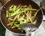 A picture of step 1 of Long Green Eggplants and Snake Gourd Sabzi.