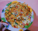 Foto del paso 3 de la receta: Tortilla de papas con cebolla de verdeo y salchichas