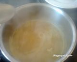 Foto del paso 4 de la receta: Pudín de croissants con crema de naranja