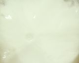 A picture of step 5 of Cheesey Spicy Garlic Potato.