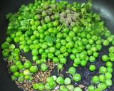 A picture of step 2 of Stir Fried Green Peas.
