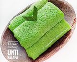 Foto langkah ke 6 dari resep Dadar Gulung Unti Kelapa.