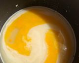 A picture of step 4 of #GA4# week21 TURMERIC COCONUT Milk rice.
