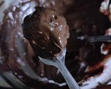 A picture of step 4 of Nutella Biscuit bomb.