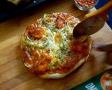 A picture of step 8 of Paneer pizza.