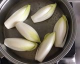 Une image de l'étape 1 de Gratin de jeunes endives aux deux jambons et emmental.