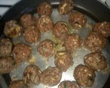 A picture of step 6 of Cheesy meatballs in sauce.