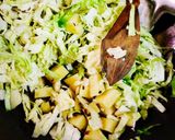 A picture of step 4 of Cabbage peas potato curry.