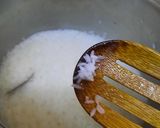 A picture of step 3 of Nolen gurer payesh or Rice kheer with date palm jaggery.