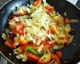 A picture of step 2 of Tomato cabbage bharta.