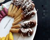 A picture of step 7 of Chocolate covered Cookie sticks.