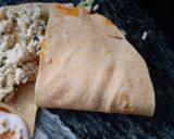 A picture of step 6 of Tortilla Wrap with egg and veggies.
