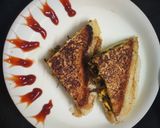A picture of step 4 of Leftover Methi Corn stuffed Rava Sandwich.