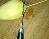 A picture of step 4 of Spiral potato and carrots on stick.