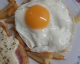Foto del paso 7 de la receta: Milanesa a la napolitana con papas fritas y huevo