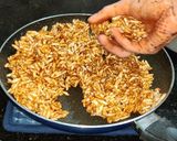 A picture of step 8 of Murmure ladoo puffed rice ladoo.