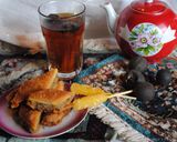 A picture of step 2 of Persian style black tea with dried lime.