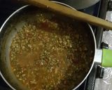 A picture of step 3 of #theme challengeRice and split green grams with egg.