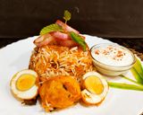 A picture of step 9 of Egg Dum Biryani.
