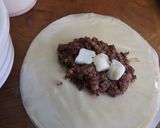 Foto del paso 2 de la receta: Empanadas de morcilla con queso feta y cebollino
