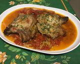 Une image de l'étape 11 de Côtes de porc aux tomates, ail rose et fanes de navets.