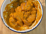 Chicken tikka on naan with fragrant salad