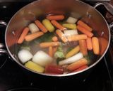 A picture of step 1 of Grande Zuppa di Formaggio Italiano.