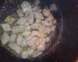 Foto del paso 3 de la receta: Jibia al ajillo en salsa de soja
