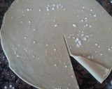 A picture of step 2 of Puri paratha in tawa style.