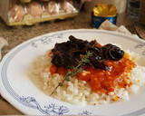 Foto del paso 7 de la receta: Arroz con Tomate aromátizado y Calamares de lata