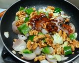 A picture of step 4 of Walnut Schezwan Stir Fry.