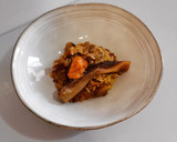 Foto del paso 11 de la receta: Arroz de calçots, alcachofas y carrilleras con romesco
