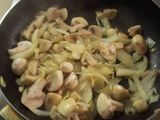 Turkey Steak Served with Potato Wedges and Black pepper mushroom sauce