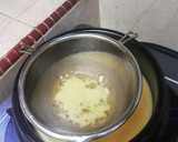 Foto langkah ke 7 dari resep Steamed Egg in Stone Pot.