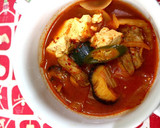Foto langkah ke 30 dari resep Ultimate Kimchi Jjigae.