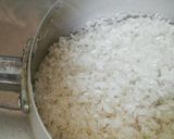 A picture of step 1 of Steamed White Rice (Nasi Putih).