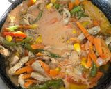 A picture of step 12 of Authentic Thai Red Chicken Curry.