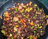A picture of step 6 of Fried Black Rice.