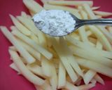 A picture of step 3 of Peri peri fries.