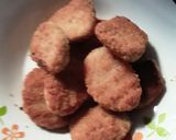 Foto del paso 3 de la receta: Papas doradas con nugget de pollo