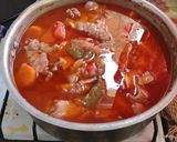 Foto del paso 5 de la receta: Pollo al escabeche