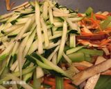 A picture of step 9 of Stir-Fried Mixed Vegetables with Egg Crepe and Curry Sauce.